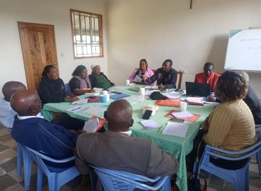 Caritas Nyahururu facilitating a monthly meeting for the Muungano Civil Society Organization.