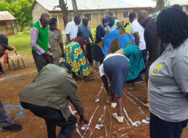 Community involvement and discussions of map drawing during the triggering process at Mbogoini village on 10th of April 2025.